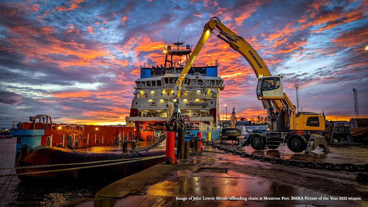 John Lawrie Metals offloading chain at Montrose Port at sunrise