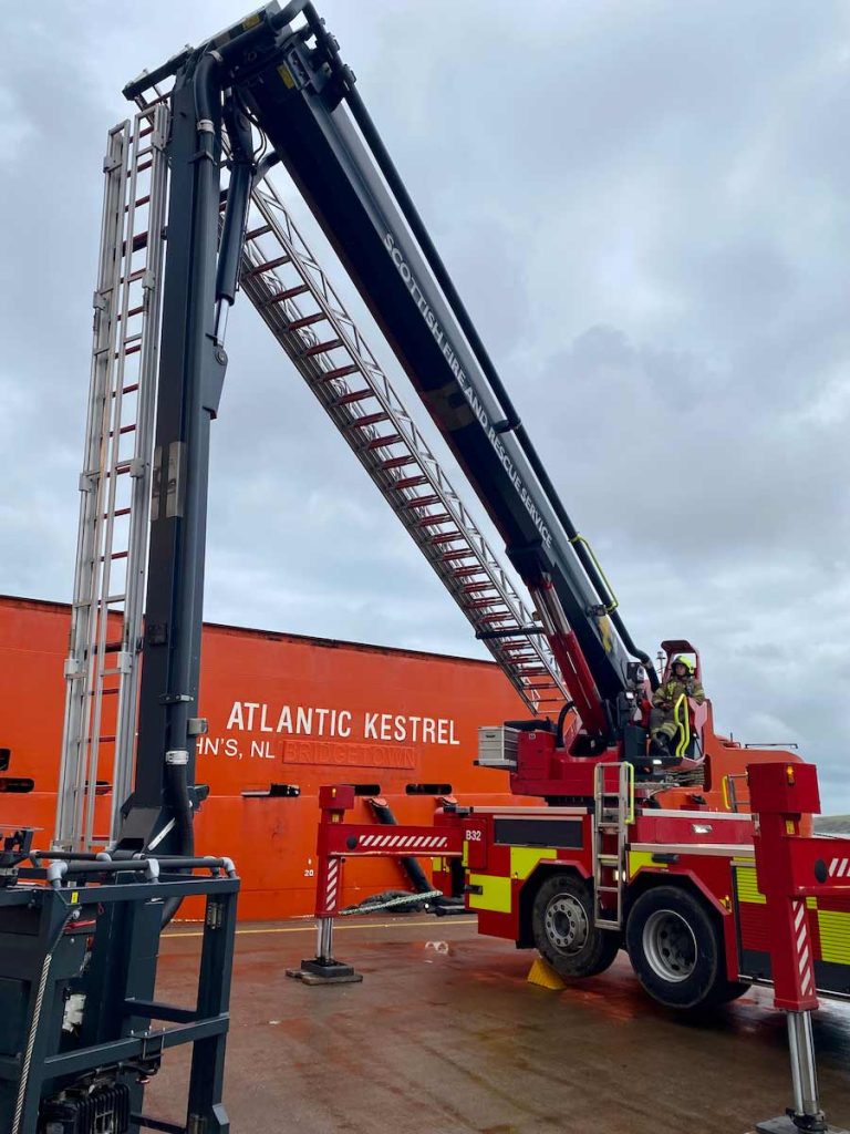 Scottish Fire and Rescue Service Aerial Platform in use during an exercise at Montrose Port Authority with the Atlantic Kestrel vessel