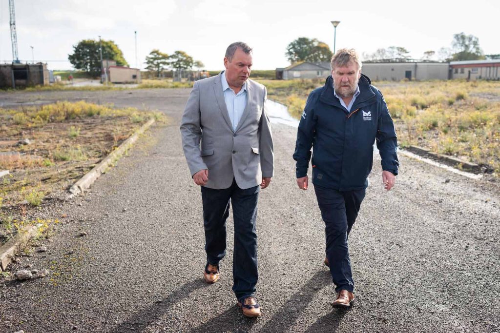 Equipco Investments owner Mark Stephen and Montrose Port Chief Executive Tom Hutchison walking together and talking at Montrose Commercial Park.