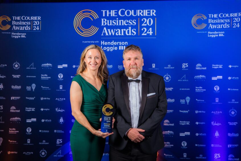 Plug CEO Maria Bos and Montrose Port CEO Tom Hutchison at The Courier Business Awards holding the Transition to Net Zero Award.