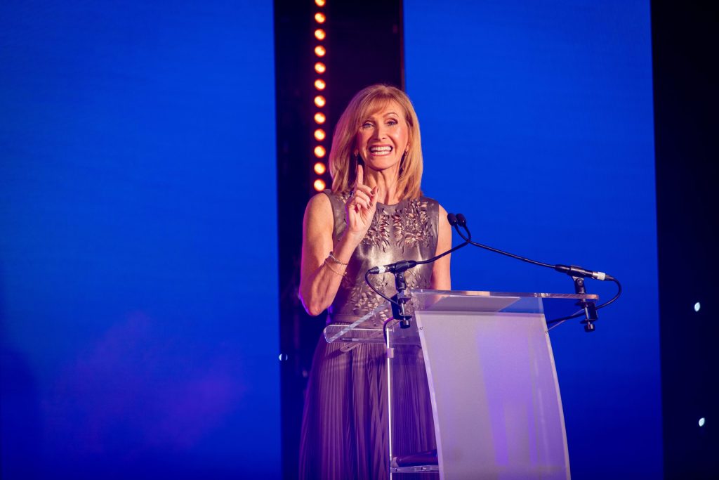 Jackie Bird at a podium at The Courier Business Awards 2024.